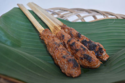 Close-up of meat on barbecue grill