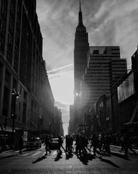 People walking on road in city