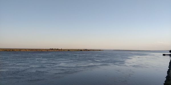 Scenic view of sea against clear sky