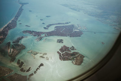 High angle view of sea seen through window