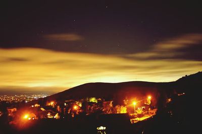 View of illuminated city at night