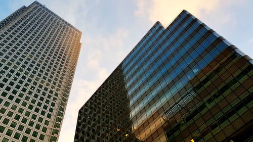 Low angle view of modern buildings against sky