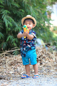 Full length of a boy wearing hat