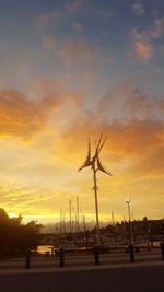 View of harbor at sunset