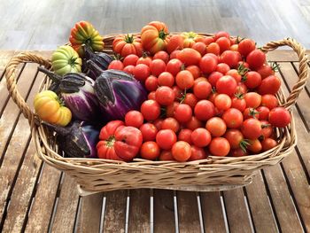 Fresh ripe vegetables in rustic basket