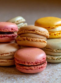 Still life of french macarons close up, in many colors and flavors