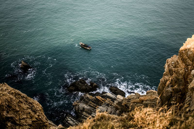 High angle view of sea seen from cliff