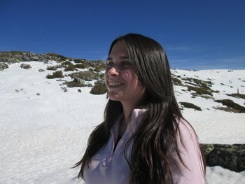 Young woman looking at horizon