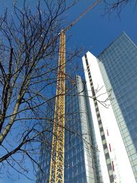 Low angle view of modern building against clear sky