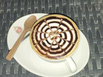 High angle view of coffee cup on table