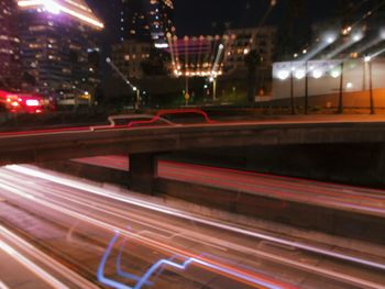 Blurred motion of car moving on road at night