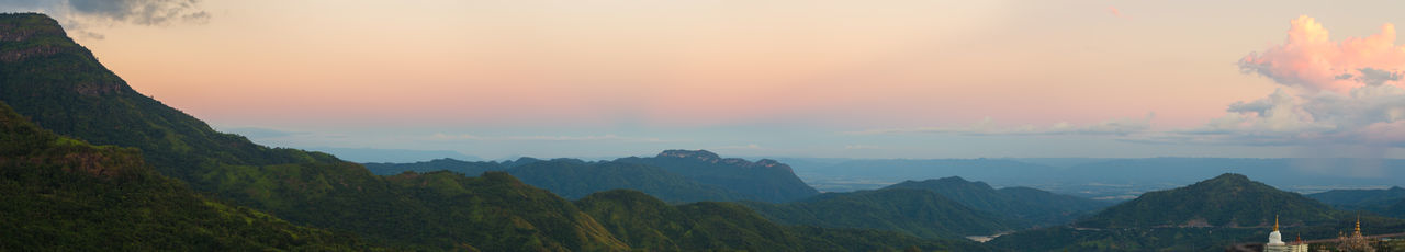 Panoramic view of mountains against sky during sunset