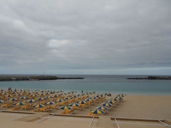 Scenic view of beach against sky