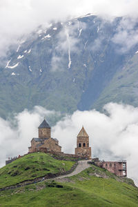 View of historic building against cloudy sky