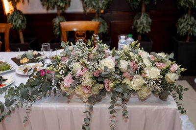 Close-up of wedding rings on table