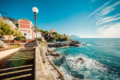 Scenic view of sea against clear blue sky