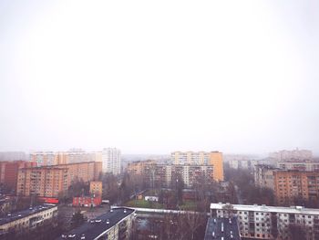 High angle view of buildings against clear sky