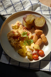 High angle view of breakfast served on table