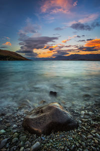 Scenic view of lake during sunset