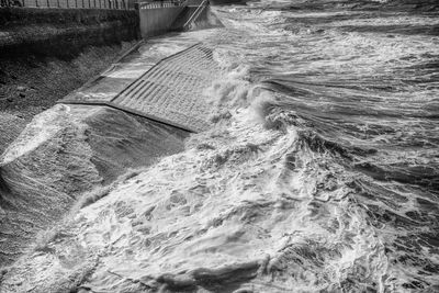 High angle view of dam on sea