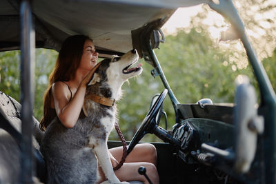 Portrait of woman with dog