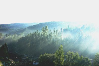 Scenic view of mountains in foggy weather