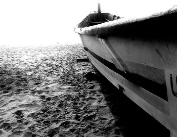 View of built structure by sea