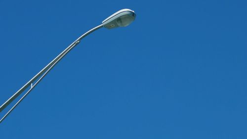 Low angle view off a street light in the  blue sky 