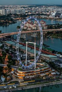 High angle view of ferris wheel in city