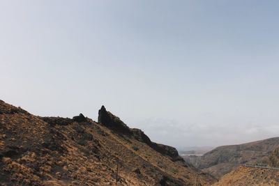 Scenic view of mountain against clear sky