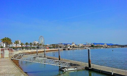 View of bridge against clear blue sky