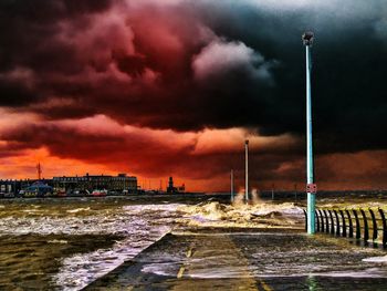 Scenic view of sea against dramatic sky