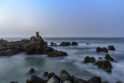 Scenic view of sea against clear sky