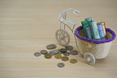 High angle view of coins on table