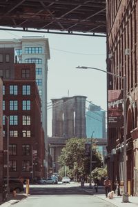 Street in city against sky