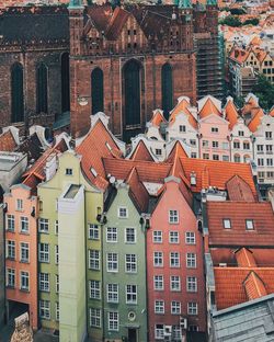 Houses in city against sky