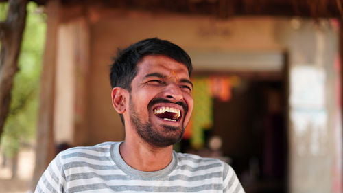 Portrait of young man smiling