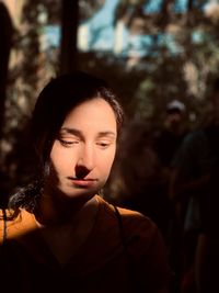 Close-up of thoughtful woman looking down