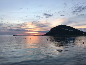 Scenic view of sea against sky at sunset