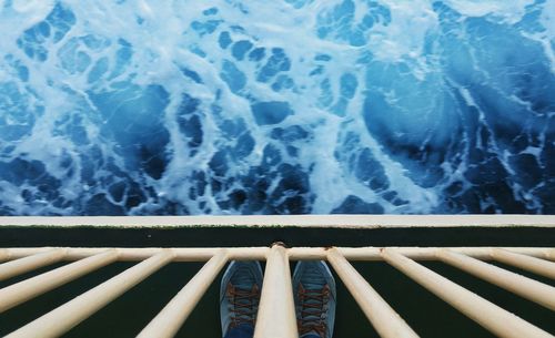 Close-up of water against blue sky