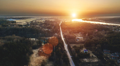 Aerial view of city during sunset