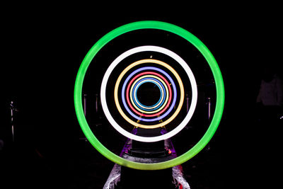 Close-up of spiral staircase against black background