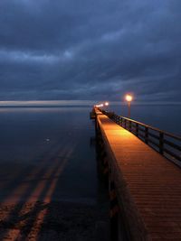 Scenic view of sea against sky at night