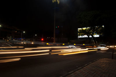 Light trails on road at night