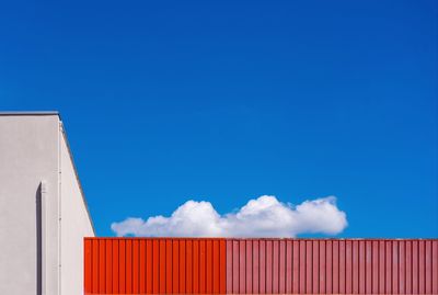 Low angle view of building against blue sky