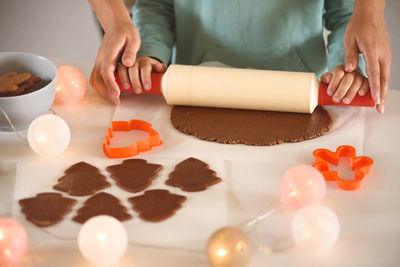 Midsection of woman preparing food