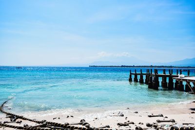 Scenic view of sea against blue sky