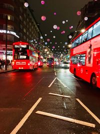 Traffic on road in city at night