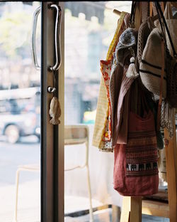 Midsection of man hanging in bus