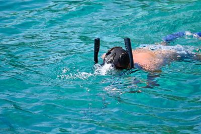 High angle view of man snorkeling 